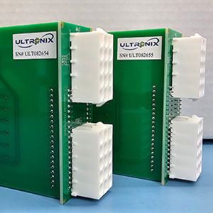 A group of green electrical boards.